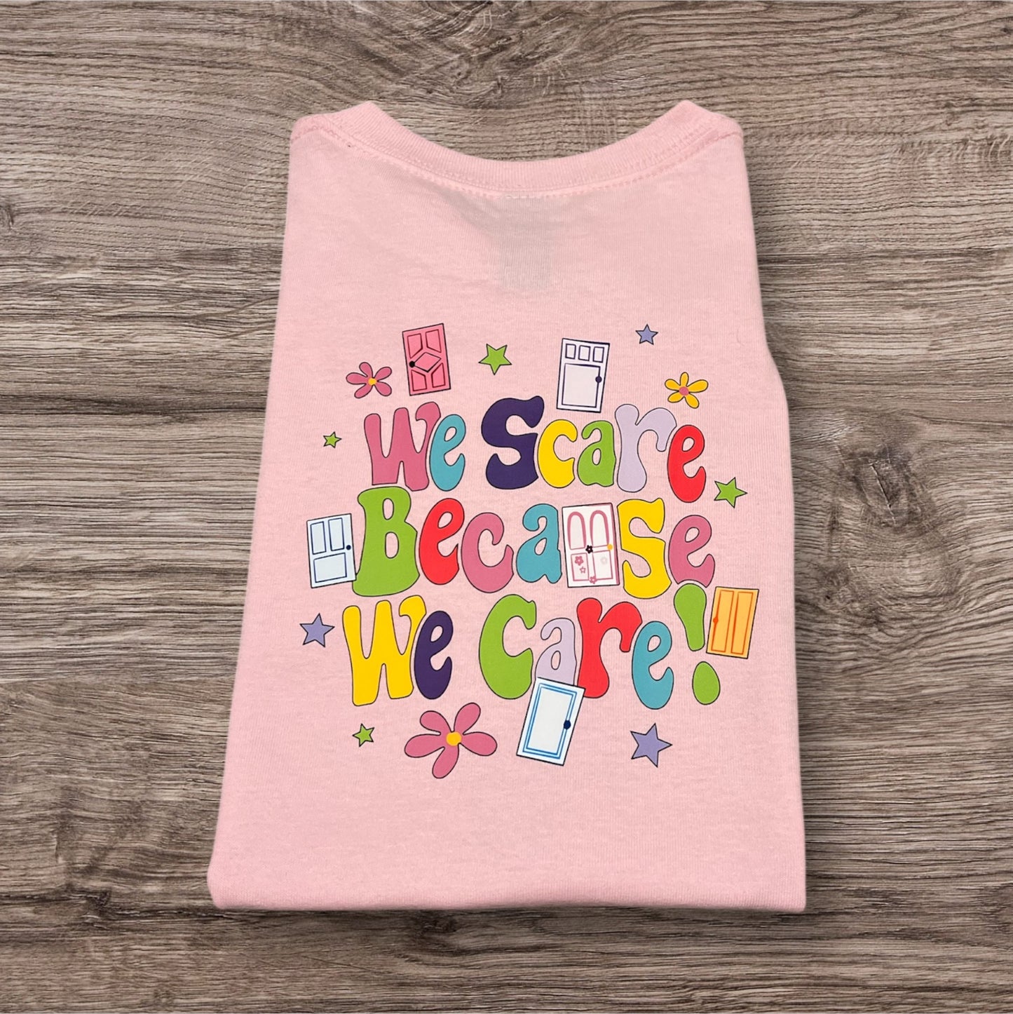 Scare because we care front & back