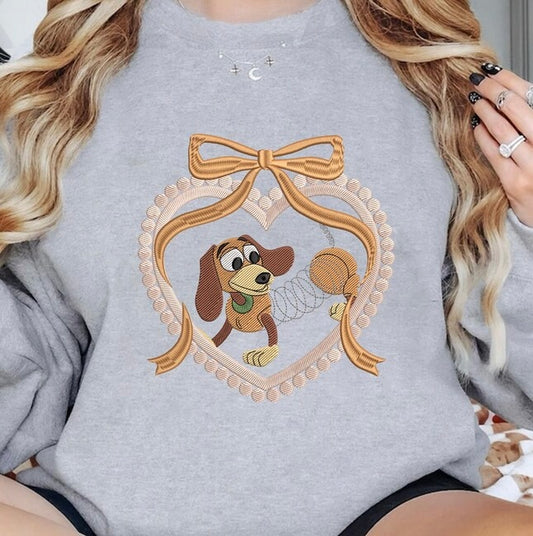 Emb - brown dog heart bow