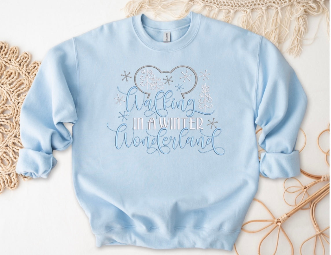 Emb - mouse walking in a winter wonderland